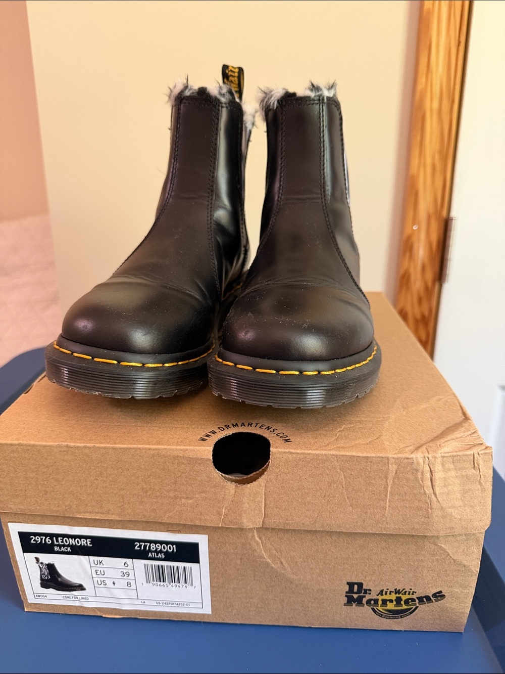 Dr. Martens Black Chelsea Boots with Yellow Stitching and zebra print fur lining